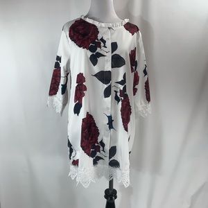 Blouse floral lace trim. Large but fits like med.